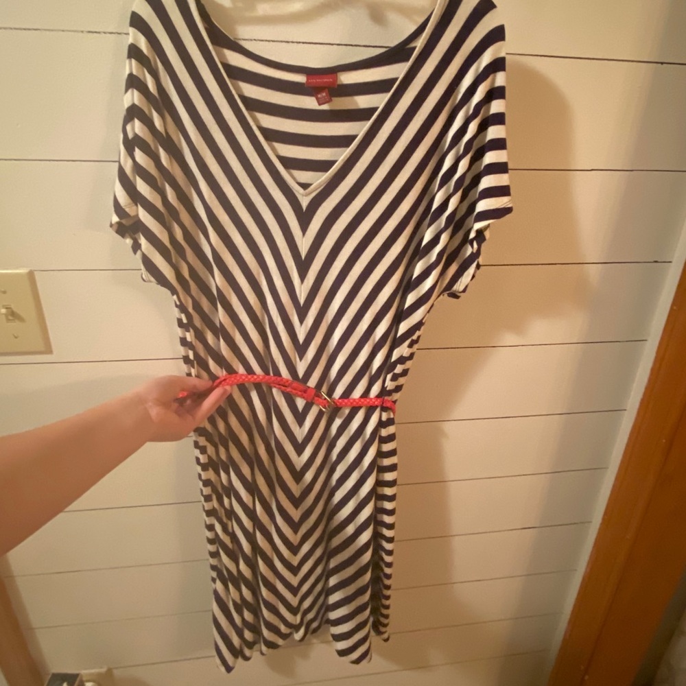 White with navy blue stripes. Comes with belt.